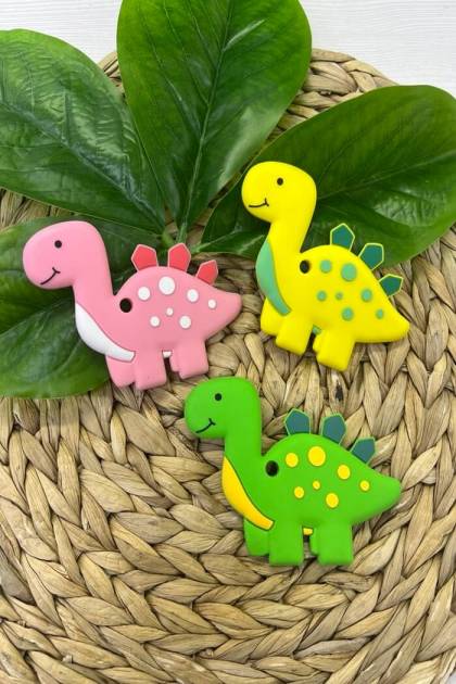 Прорезыватель грызунок Динозаврик с улыбкой (Цвет: Розовый)